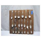Souvenir Spoons on Display Board