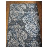 Rectangular Area Rug with Elegant Pattern