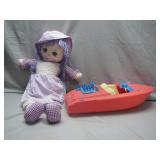 Rag Doll and Plastic Toy Boat Set