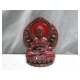 Red Buddha Figurine with Ornate Detailing