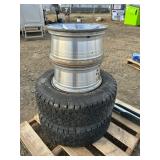(4) DODGE 5 BOLT RIMS (2) W/ 265/70R17 TIRES