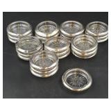 Collection of Twenty-Five Silver and Glass Coaster