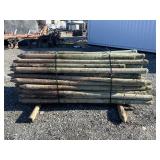 1- Bundle 8' Used Treated Wood Posts