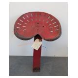 Red Vintage Metal Tractor Seat