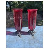 Red vase candle holders with cast iron holders