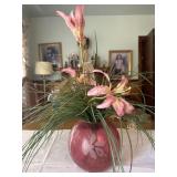 Pink vase with faux flowers