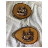 Copper relief on wood piece