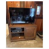 TV stand, TV, VHS and bluray player