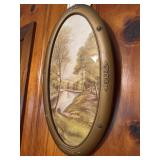 Framed oval picture