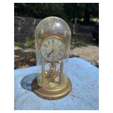 Clock with glass globe