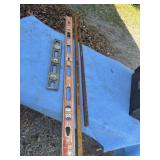 Aluminum levels and wooden rulers