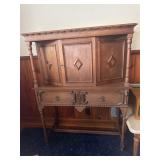 Antique Jacobean style carved cabinet with key