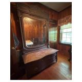 Vintage dresser with large ornate mirror