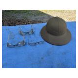 Vintage safety glasses and safari hat