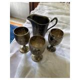 Sterling Silver pitcher and glasses