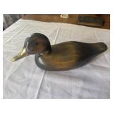 Wood duck with brass beak