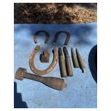 Military shells and horseshoes and cowbell