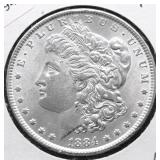 1884 MORGAN DOLLAR AU