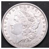 1885 MORGAN DOLLAR AU