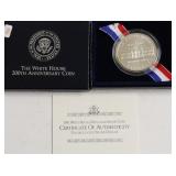GEM WHITE HOUSE SILVER DOLLAR W BOX PAPERS