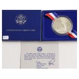 GEM BU ELLIS ISLAND SILVER DOLLAR W BOX PAPERS