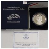 PROOF LINCOLN SILVER DOLLAR W BOX PAPERS