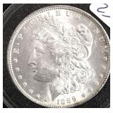1889 MORGAN SILVER DOLLAR AU