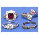 4 STERLING SILVER RINGS