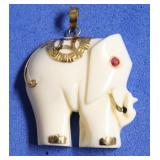 WHITE ELEPHANT TRIMMED IN 14K GOLD