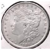 1886 MORGAN DOLLAR AU