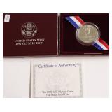 OLYMPIC HALF DOLLAR W BOX PAPERS