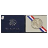 GEM OLYMPIC SILVER DOLLAR W BOX PAPERS