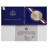 GEM BU ELLIS ISLAND SILVER DOLLAR W BOX PAPERS