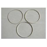 THREE HEAVY STERLING BANGLE BRACELETS