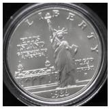 GEM BU ELLIS ISLAND SILVER DOLLAR