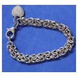 STERLING SILVER CHARM BRACELET