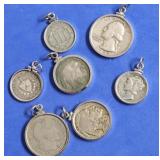 ASSORTMENT OF COIN PENDANTS