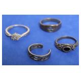 4 STERLING SILVER RINGS