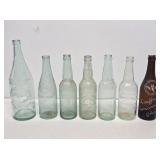 Early Embossed Blue Glass Bottles