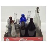 Assorted Amber, Clear & Blue Glass Bottles
