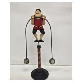 Balancing Strong Man Sculpture