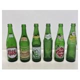 Early Green Glass Soda Bottles
