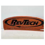 RevTech Embossed Metal Sign