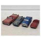 4 Early Auburn Rubber Toy Cars