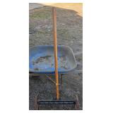 Tobacco bed seed spreader