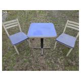 Barn kept table and metal chairs