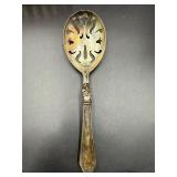Repaired.. sterling silver handle serving spoon