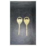 Vintage brass tennis racket bottle openers