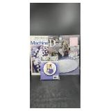 Craft magazines and cross stitch kit.