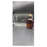 Pyrex baking dish and Log Cabin bottle.